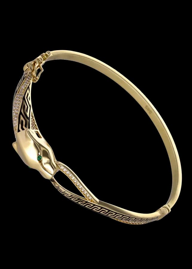 Armreif mit goldenem Pantherkopf, grünen Augen, Diamanten und Emaille