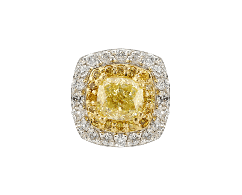 Ansicht von oben auf einen auffälligen Halo-Ring mit gelbem Diamanten im Cushion-Cut